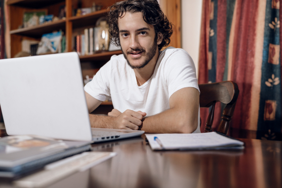 CDU student Nicholas studying laptop online