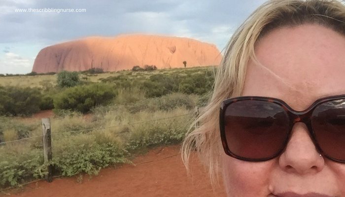 Rachel Ashton with Uluru in the background