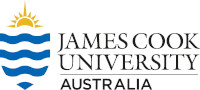 James Cook University logo. Shield with blue waves below and partial yellow sun above on the left, "James Cook University Australia" on the right.