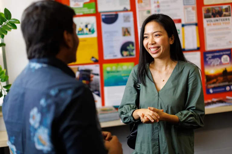 two students talking to one another