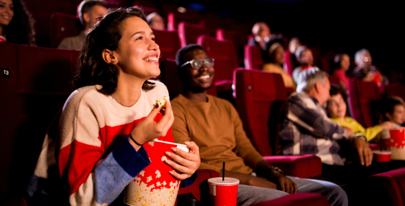 People watching a movie screening