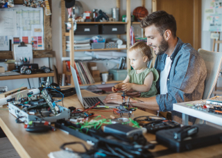 Engineering student with child