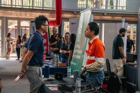 man stands at expo both