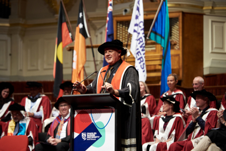 Scott Bowman addressing graduating class