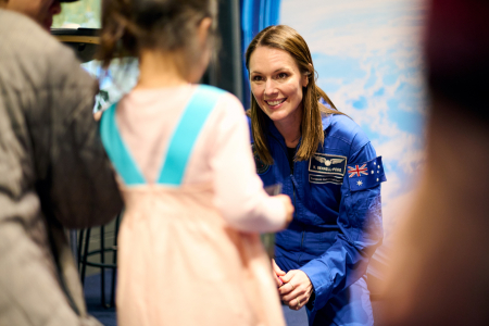 Australian Astronaut greets child