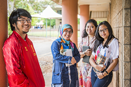 Indonesian staff and students visit Casuarina campus. From left: UGM student Muhammad Luthfiyanto, law lecturer Professor Mailinda Eka Yuniza, and students Hanggana Rasas P.T. and Lulu Fitriani
