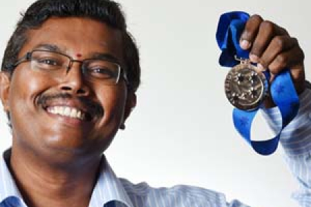Senior Lecturer in Clinical Sciences Dr Rama Jayaraj with his 2015 Pride of Australia “Inspiration Medal” for the NT.