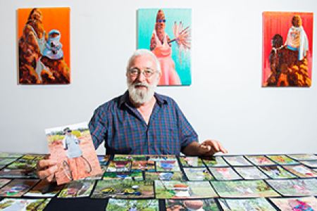 CDU Masters student Ian Hance is collecting stories and painting portraits of decorated termite mounds