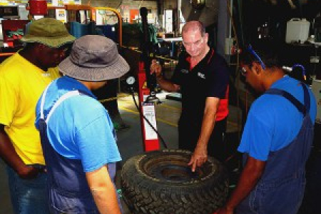 Automotive lecturer Robert Tucker delivers the tyre technology course at Alice Springs Corrections Centre.
