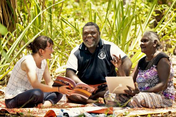 Researchers sat down on ground planning