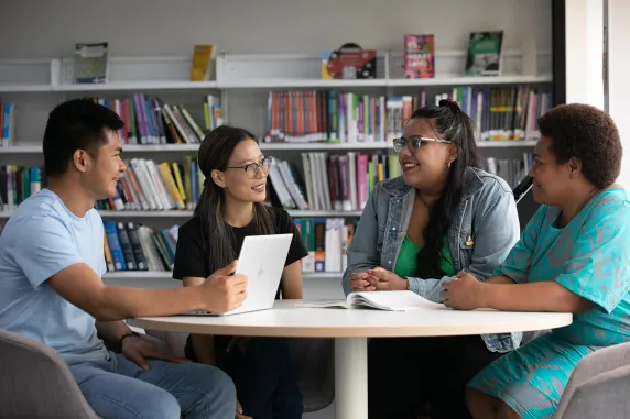 students sitting around a table at sydney campus