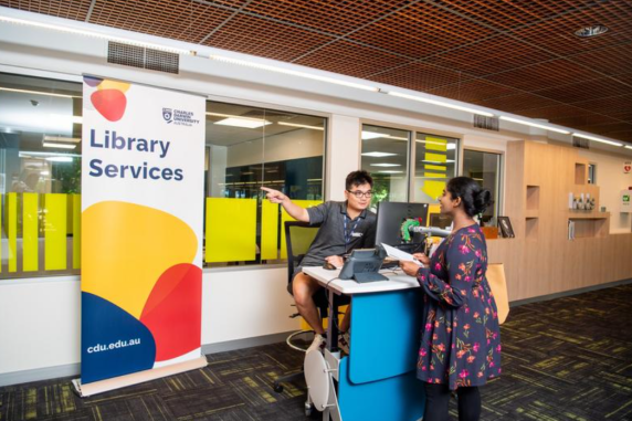 client receives assistance from Library services