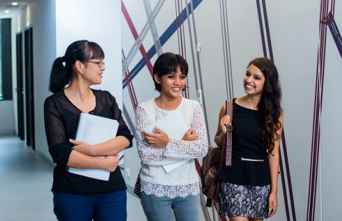 learning and teaching - three students at the waterfront