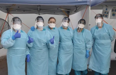 Jessica Lacey with nursing colleagues at Howard Springs