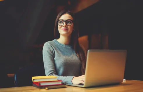 Student studying on laptop