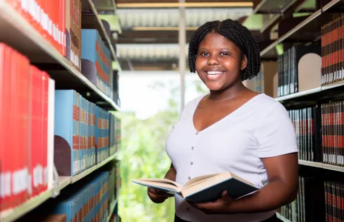 Law student Sizol at Casuarina campus library
