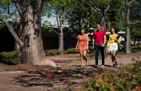 CDU students walking across Casuarina campus