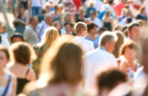 Image of large crowd and people walking