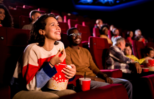 People watching a movie screening