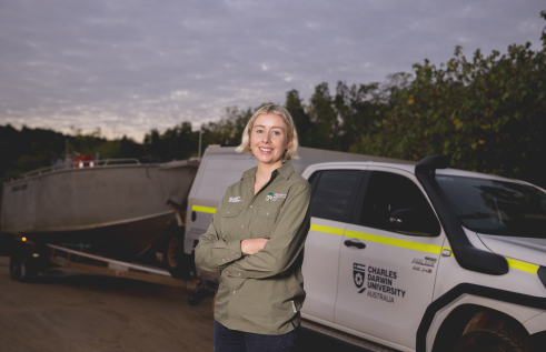 Research student Julia with her fieldwork boat