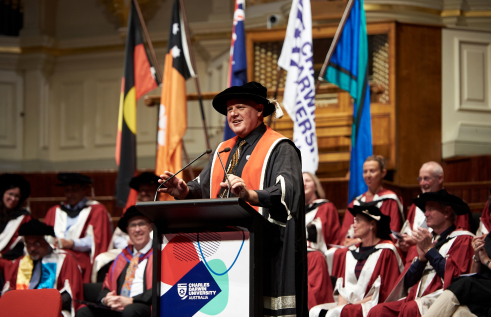 Scott Bowman addressing graduating class