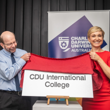 CDU Vice Chancellor Prof  Simon Maddocks unveils the CDU international College plaque with UP Education CEO of University Partnership's Marnie Watson.