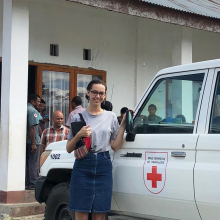 CDU student Stephanie von Kanel standing in front of a Red Cross van