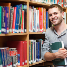 male student in a library