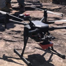 Drone standing on rock