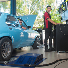 Light vehicle automotive students with the new dynamometer at Casuarina campus, from left: Tyrone Anderson and Kevin Bucher