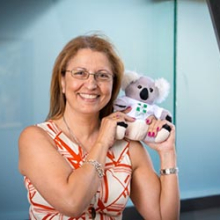 CDU Pharmacy lecturer Hana Morrissey holds mascot for mental health first aid, ALGEE the koala