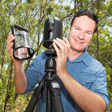 Dr Shaun Levick uses the 1kg Leica BLK360 laser scanner to map field sites that can only be accessed on foot. Photo: Julianne Osborne